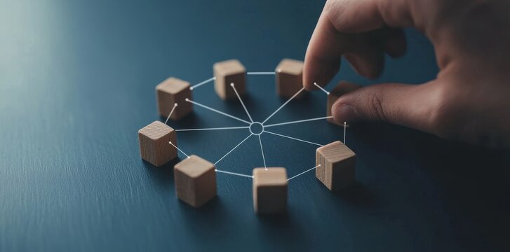 Management and organizational concepts of business process management and automation with wooden pieces moving on a flowchart diagram. Improvements to productivity and efficiency through workflow