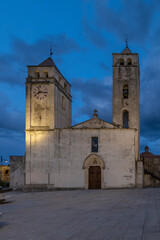 Fototapeta premium The ancient Parish church of San Vito Martire at dusk, San Vito, Sardinia, Italy