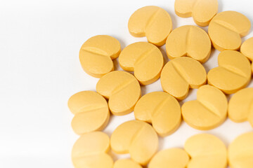 Heart medication pills on a clean white background. Ideal for medical, healthcare, or pharmaceutical concepts, highlighting treatment and cardiovascular health.