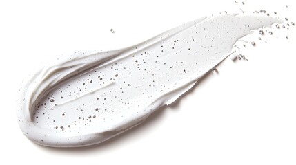 White creamy skincare product smear with exfoliating particles