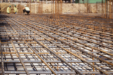 Reinforcement Iron Grate for Pouring Reinforced Concrete Foundation in Construction Site. Preparation Base for Pouring concrete. 