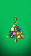The Christmas tree is made of Christmas balls decoration. Minimum New Year concept. Vertical banner...