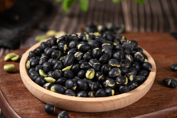 Black Soybean baked roasted fried shell cracked on table.