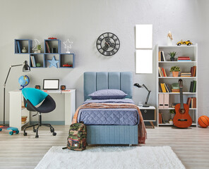 Teenage bedroom interior concept with bookshelf, lamp, table, book and notebook, frame, guitar, bedding set and home accessory style, architecture decoration.
