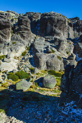 A dramatic rock formation with steep stone steps leading upward