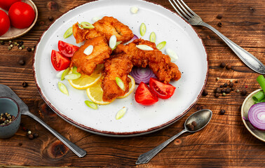 Fried fish in batter.