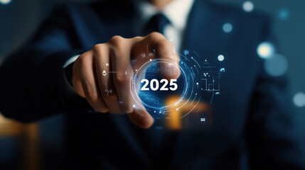 Happy New Year 2025: Businessman Pressing Start Button on Virtual Screen for Planning Career Path, Business Strategy, Opportunity, and Change