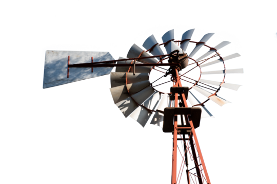 Vintage Metal Windmill Against Clear Sky"