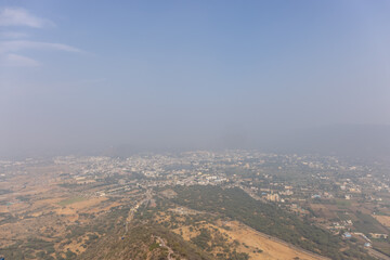 Arial view of pushkar city from the top. Building and fair ground view from the top angle.	
