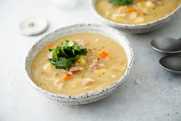 Homemade pea soup with smoked meat