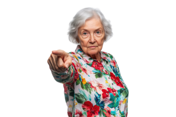 Serious elderly woman pointing forward with determined expression on a transparent background