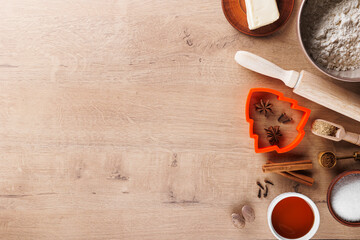 Ingredients for baking cookies: flour, rolling pin, spices, sugar, honey, butter, ginger, cookie...