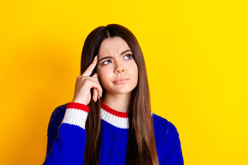 Photo portrait of pretty teen girl look minded empty space wear trendy knitwear blue outfit...