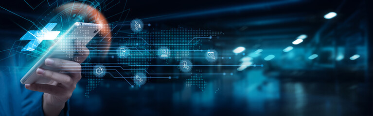 Businessman using smartphone with healthcare applications on network connection. Telemedicine, patient monitoring, electronic health records, remote consultations, wearable devices, digital health.