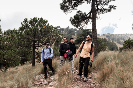 Young men enjoy a leisurely hike in Cumbres del Ajusco, Mexico
