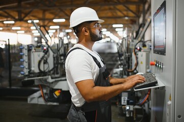 PVC industry worker or operator making frames for windows and doors