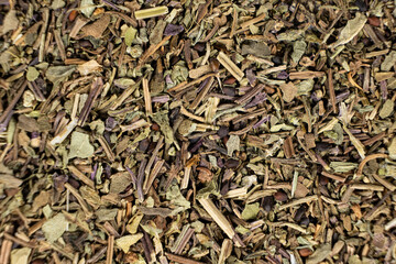 Dry basil spice seasoning macro texture top view