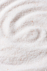 Natural Himalayan Pink Salt Fine Ground Top View Abstract Texture Vertical Background
