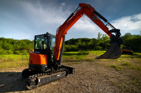 Small-sized construction special equipment in a natural location. The concept of using not full-size equipment