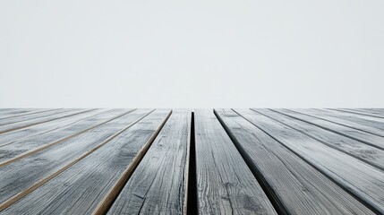 Perspective view of an empty wooden table, set against a plain white background, perfect for showcasing products or creating montage scenes.