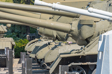 Military war tank. Part of the weapon in close up. Military khaki coloring. Metal weapons. Arms supplies for Ukraine. Ukrainian and Russian tanks, detail of weapons from the Russian-Ukrainian war.
