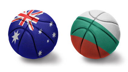 basketball balls with the national flags of bulgaria and australia on the white background.