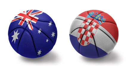 Obraz premium basketball balls with the national flags of croatia and australia on the white background.