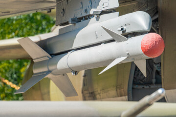 Close-up view of Ukrainian Air to air missile hanging under the wing of fighter aircraft. Soft...