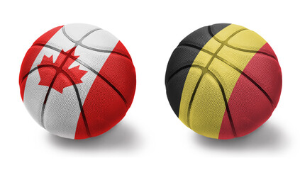 basketball balls with the national flags of belgium and canada on the white background.