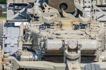 Supplies of weapons for Ukraine. Ukrainian artillery, detail of weapons Russian-Ukrainian war. Part of the weapon in close up. Military khaki coloring. Metal gun metal. New guns artillery