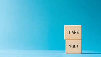 Danke dir thank you letters on wooden blocks and two shiny hearts on the light grey background, thank you card in German language