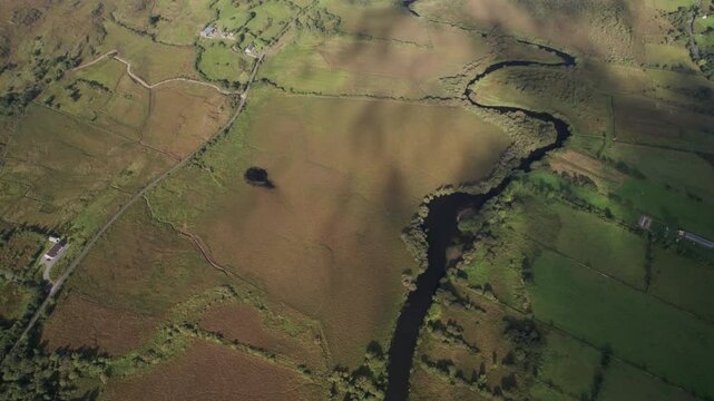 Spectacular 4K aerial footage of mountain valley from above with scenic mountains and countryside,  Maam west, Connemara, Galway, Ireland