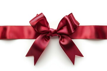 A red ribbon tied to a bow on a white surface