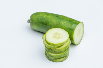Half cut and stacked slices of cucumber