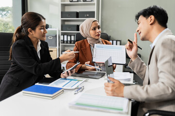 Group of diverse business people discussing a project in a meeting for analysis graph company financial.