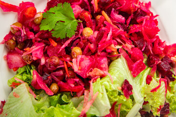 beet salad Baked beetroot, potatoes, green peas, green leaf salad tasty food dish Fresh gourmet food background on the table rustic food top view copy space top view keto and paleo diet Vegetarian