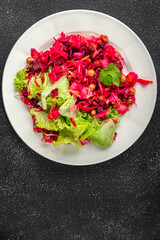 beet salad Baked beetroot, potatoes, green peas, green leaf salad tasty food dish Fresh gourmet food background on the table rustic food top view copy space top view keto and paleo diet Vegetarian