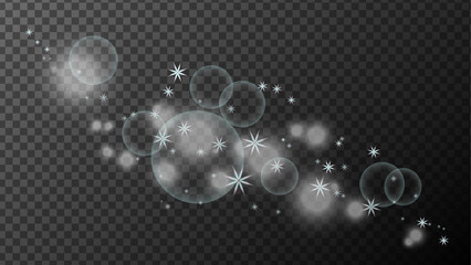 Vector effect of silvery glow. Snowflakes in shiny balls, round shapes. Brilliant stars, glowing sparks on a transparent background with lots of flashes, lights and sparks.