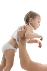 Happy father holding his son in his arms