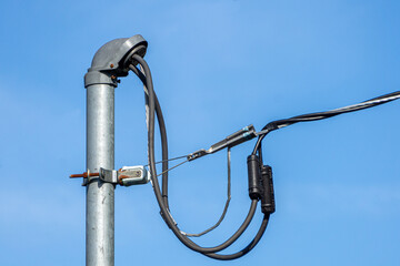 Close-up of a residential electric connection and weatherhead.