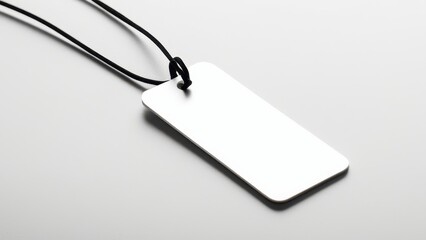 Fototapeta premium Realistic bookmark mockup featuring a simple, rectangular design. Perfect for showcasing book-related designs or promotional materials in a clean, minimal setting