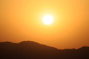 Obraz premium Breathtaking Sunset View Over the Hills