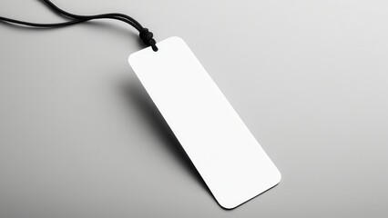 Realistic bookmark mockup featuring a simple, rectangular design. Perfect for showcasing book-related designs or promotional materials in a clean, minimal setting