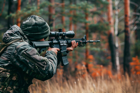Camouflaged soldier takes aim with a sniper rifle in the forest, blending seamlessly with the environment.