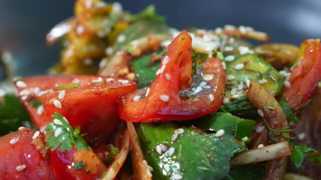salad of ofaschi, pepper, greens. Garnished with sesame seeds and sauce