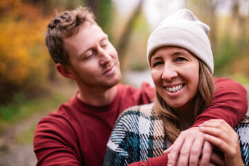 Fototapeta premium photo of harmony romantic couple in october autumn forest town park