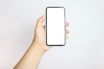 Young Male hand showing smartphone with white blank screen mock-up