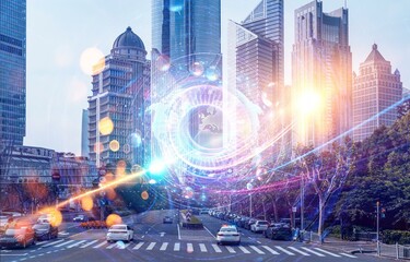 A cityscape with high rise buildings and an overlay of a digital earth map. The busy street below has cars, trees, and a crosswalk.