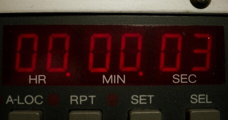 Timer in a professional tape recorder while recording studio sounds. Close-up of the screen with the countdown