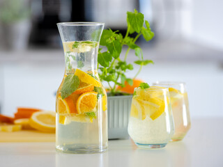 Preparing Homemade Lemonade From Lemons And Oranges Is A Refreshing Activity